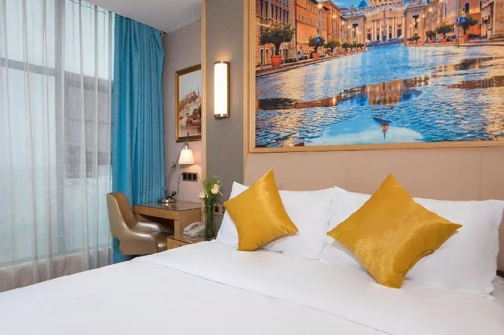 Bed in Vienna Hotel Guangdong Zhaoqing East Station Dinghu Mountain Scenic Area