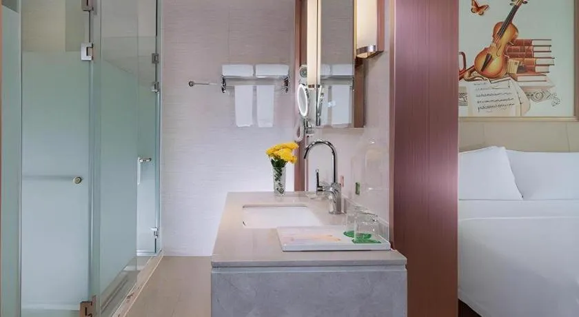 Bed in Vienna Hotel Guangdong Zhaoqing East Station Dinghu Mountain Scenic Area