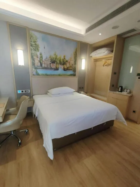 Bed in Vienna Hotel Guangdong Zhaoqing East Station Dinghu Mountain Scenic Area
