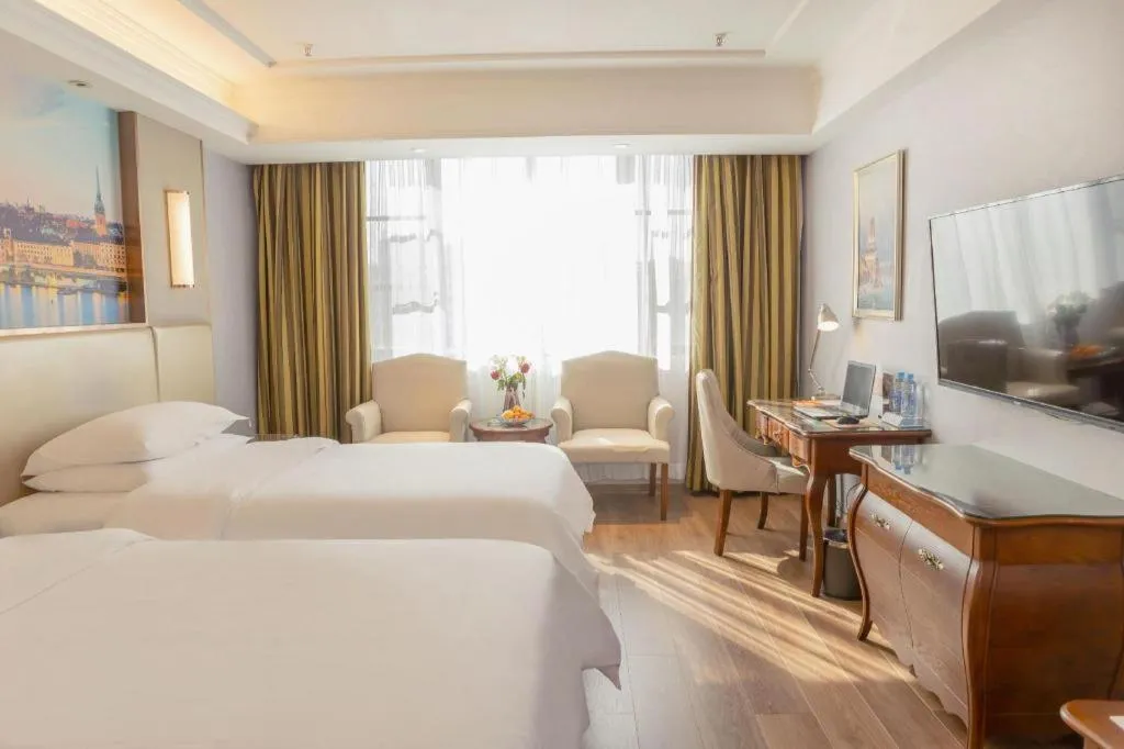 Bed in Vienna Hotel Jiangxi Fuzhou Lichuan Kangshu