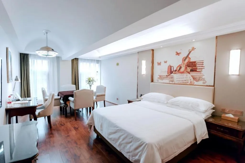 Bed in Vienna Hotel Jiangxi Fuzhou Lichuan Kangshu