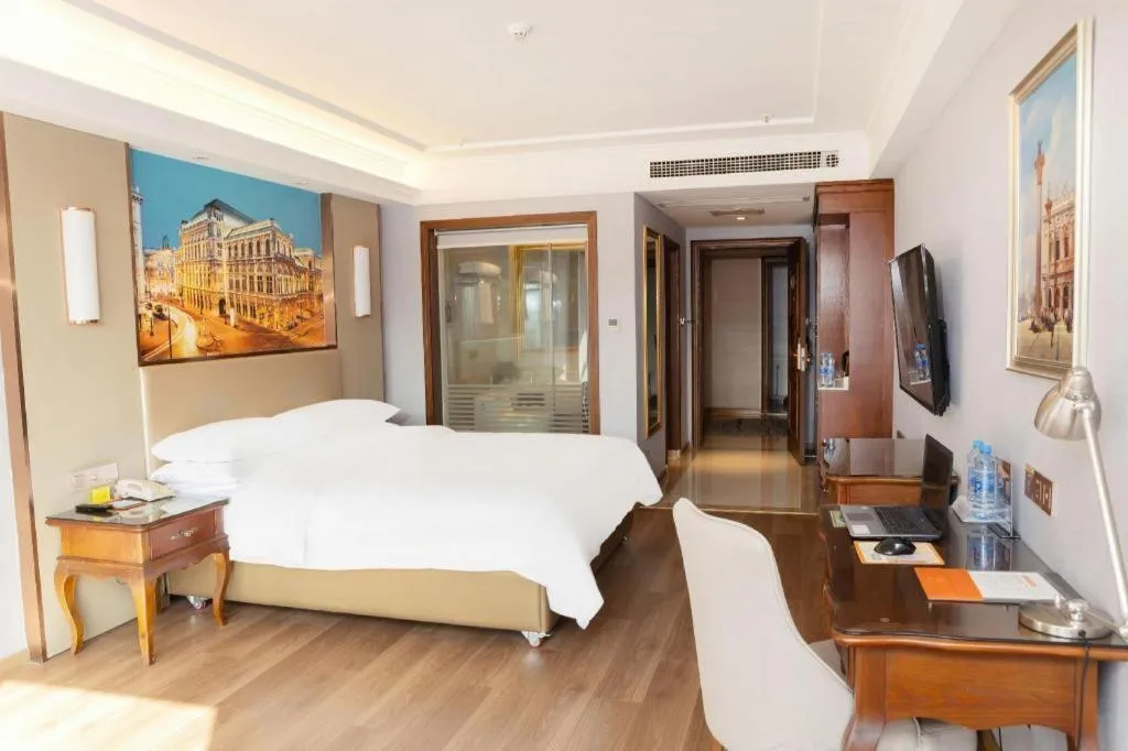 Bed in Vienna Hotel Jiangxi Fuzhou Lichuan Kangshu