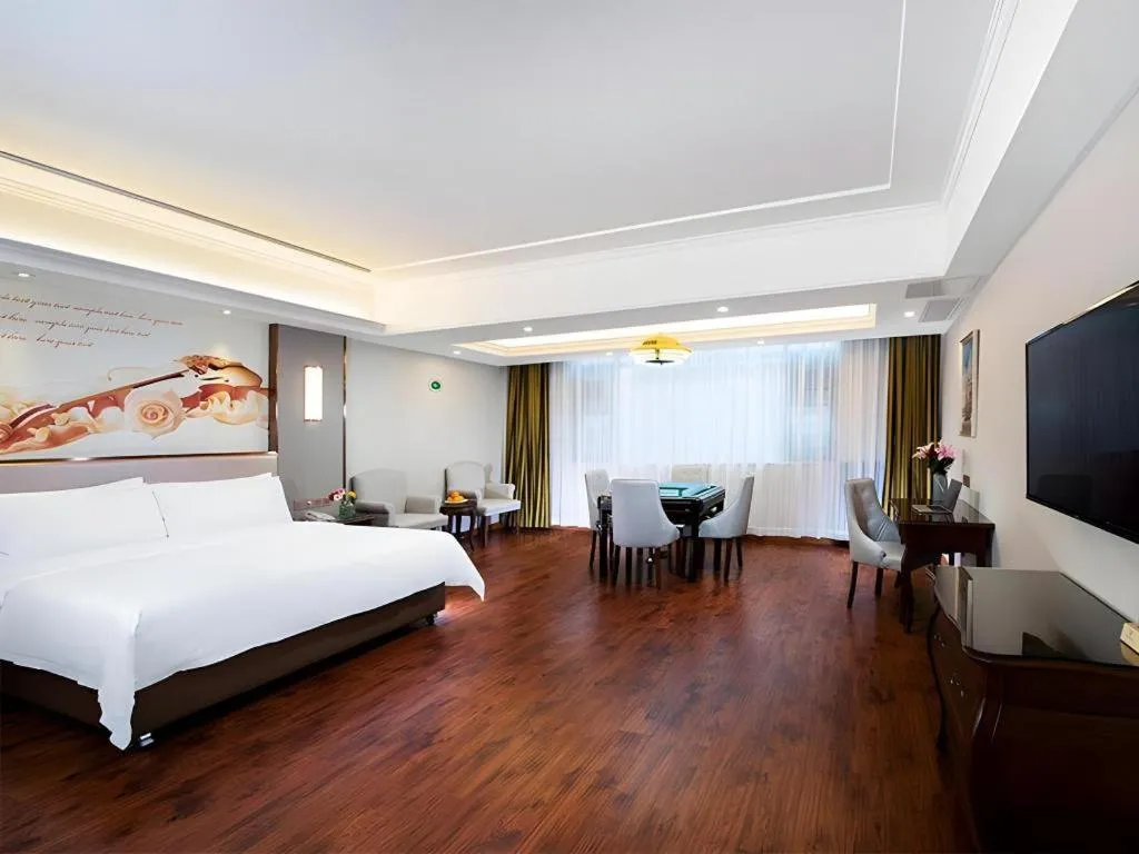 Bed in Vienna Hotel Jiangxi Fuzhou Lichuan Kangshu