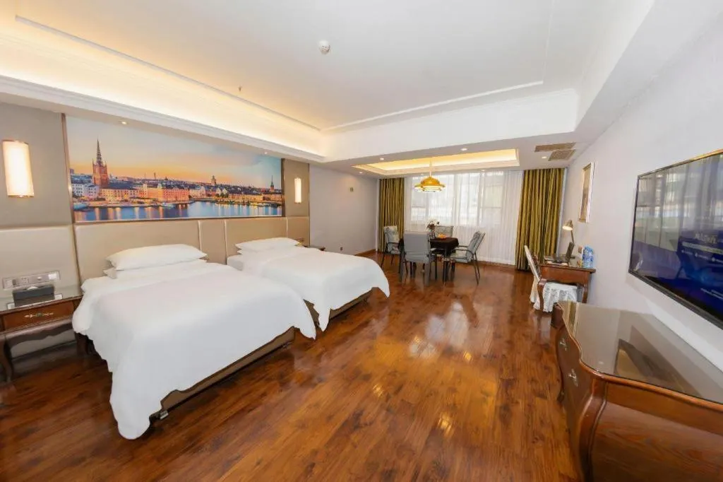 Bed in Vienna Hotel Jiangxi Fuzhou Lichuan Kangshu