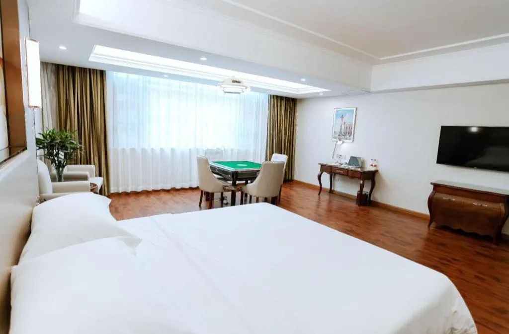 Bed in Vienna Hotel Jiangxi Fuzhou Lichuan Kangshu