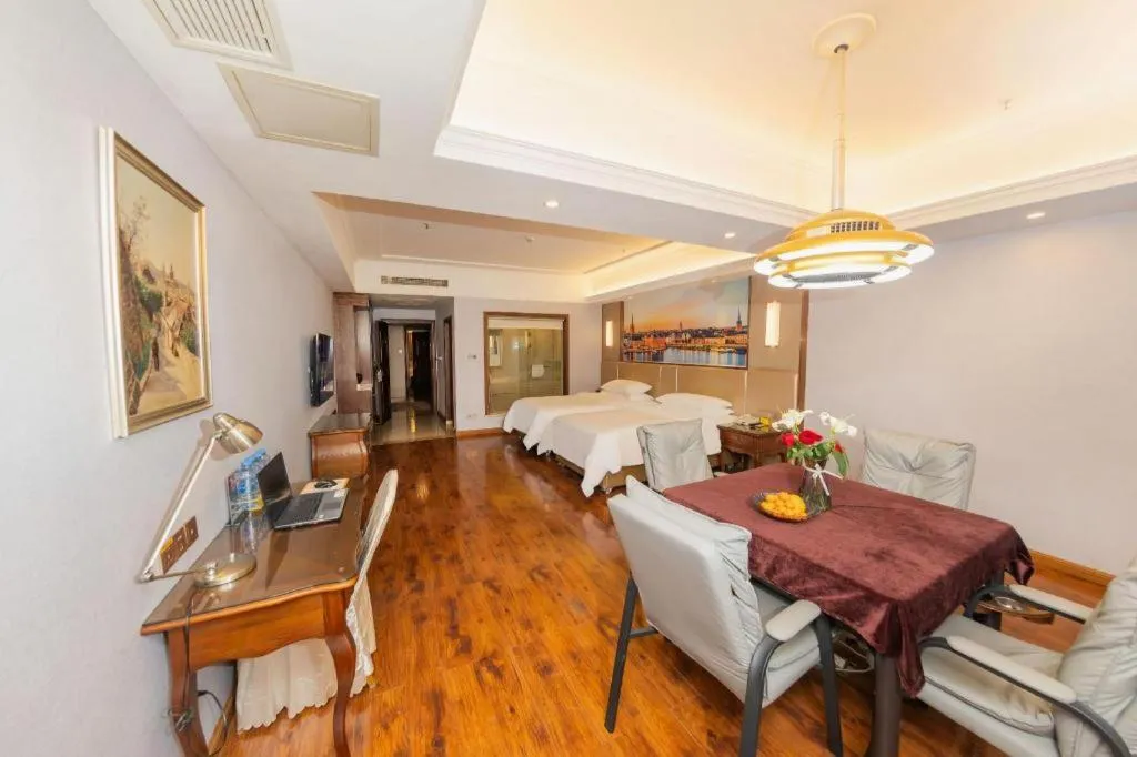 Bed in Vienna Hotel Jiangxi Fuzhou Lichuan Kangshu