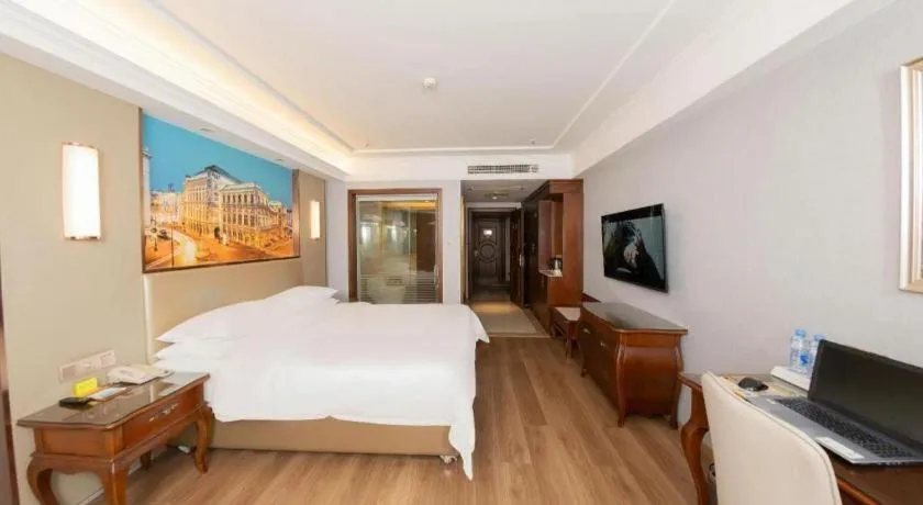 Bed in Vienna Hotel Jiangxi Fuzhou Lichuan Kangshu