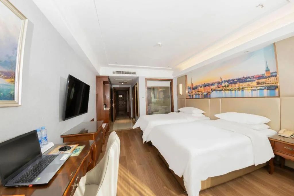 Bed in Vienna Hotel Jiangxi Fuzhou Lichuan Kangshu