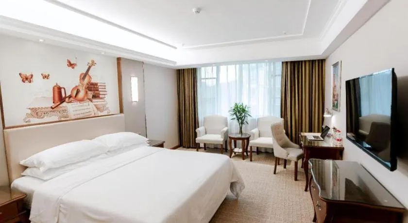 Bed in Vienna Hotel Jiangxi Fuzhou Lichuan Kangshu