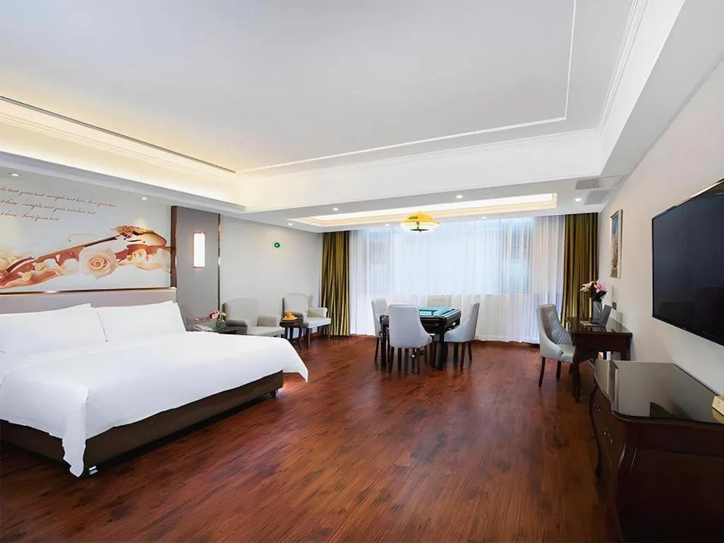 Bed in Vienna Hotel Jiangxi Fuzhou Lichuan Kangshu