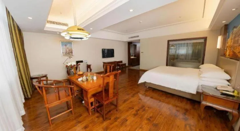 Bed in Vienna Hotel Jiangxi Fuzhou Lichuan Kangshu