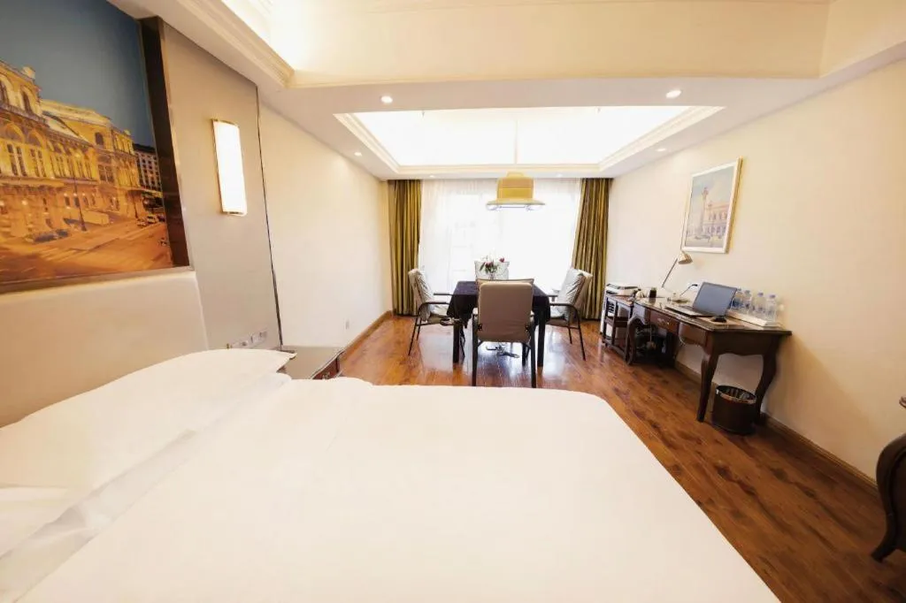 Bed in Vienna Hotel Jiangxi Fuzhou Lichuan Kangshu