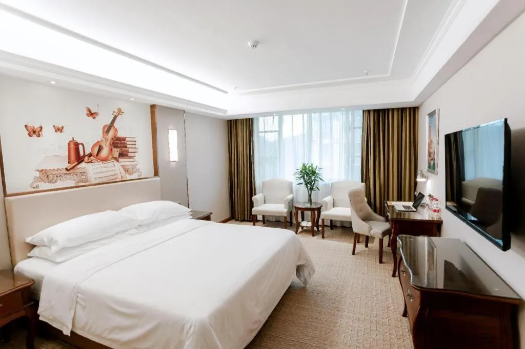 Bed in Vienna Hotel Jiangxi Fuzhou Lichuan Kangshu