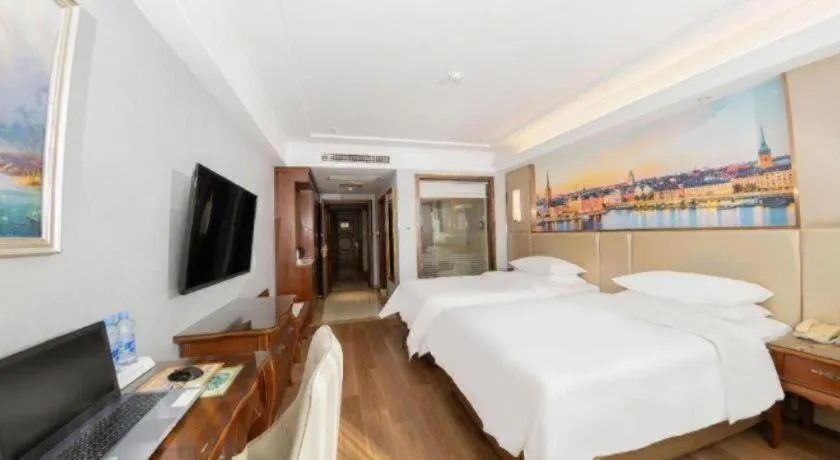 Bed in Vienna Hotel Jiangxi Fuzhou Lichuan Kangshu