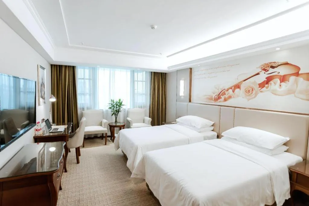 Bed in Vienna Hotel Jiangxi Fuzhou Lichuan Kangshu