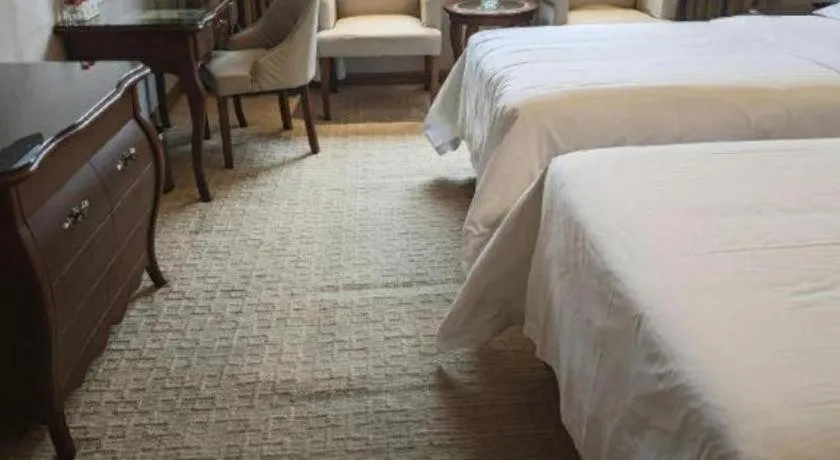 Bed in Vienna Hotel Jiangxi Fuzhou Lichuan Kangshu