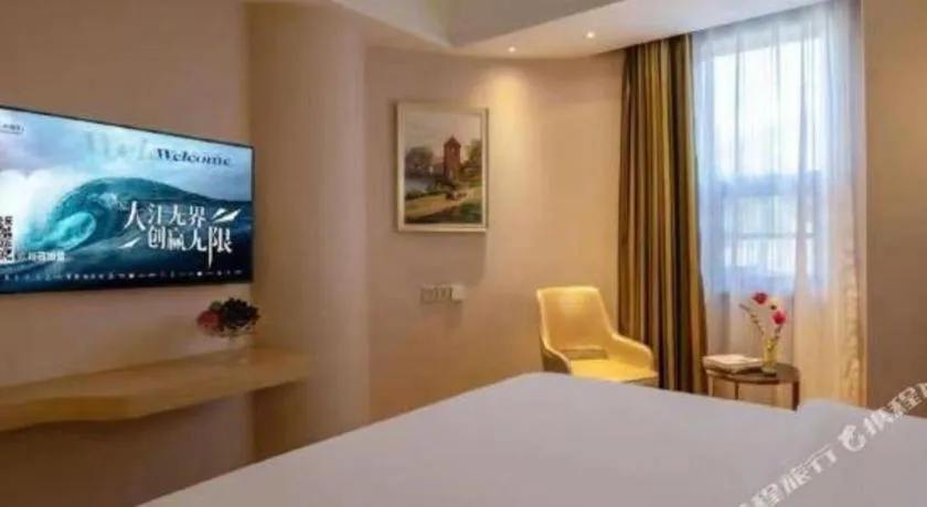 Bed in Vienna Hotel Yunnan Lijiang Ancient City