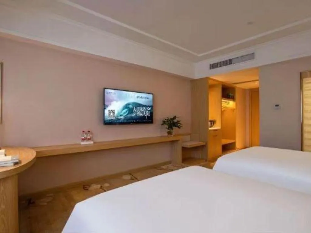 Bed in Vienna Hotel Yunnan Lijiang Ancient City