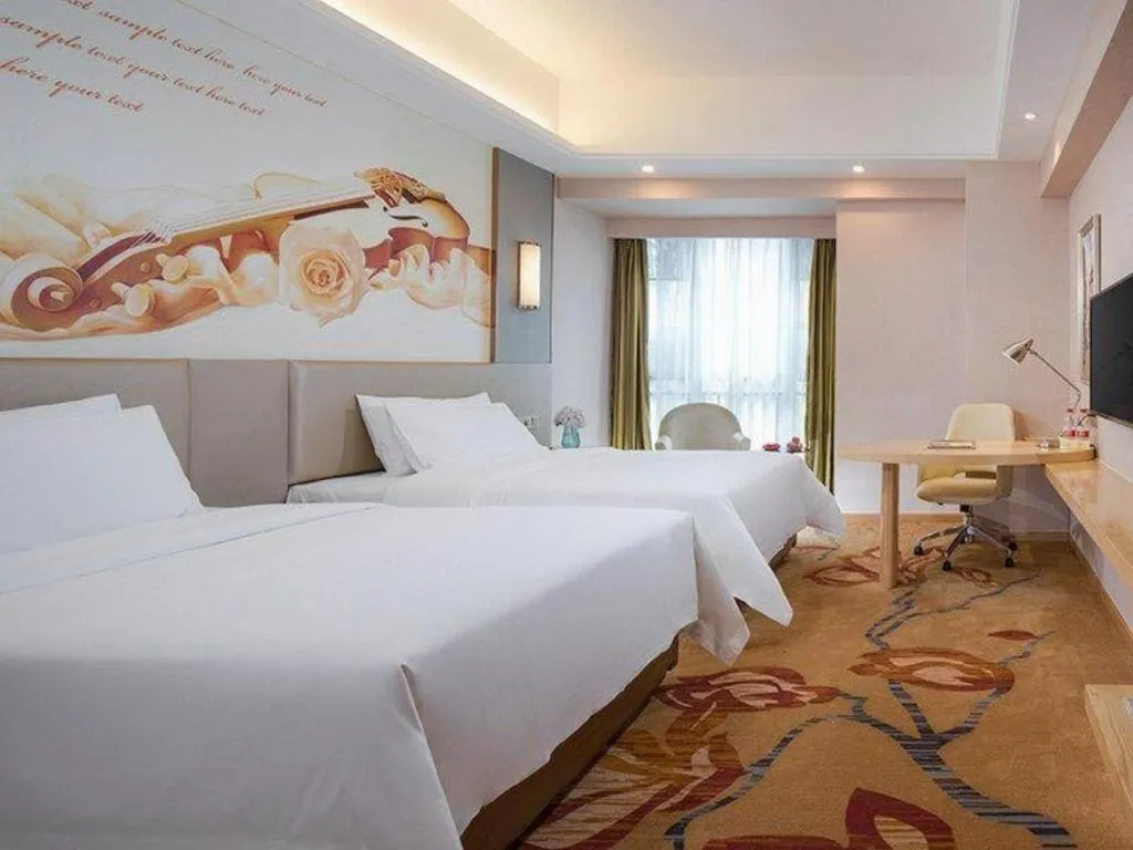 Bed in Vienna Hotel Yunnan Lijiang Ancient City