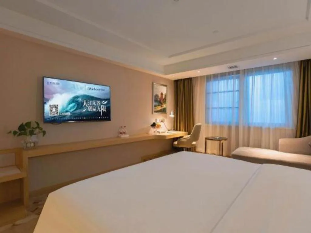 Bed in Vienna Hotel Yunnan Lijiang Ancient City