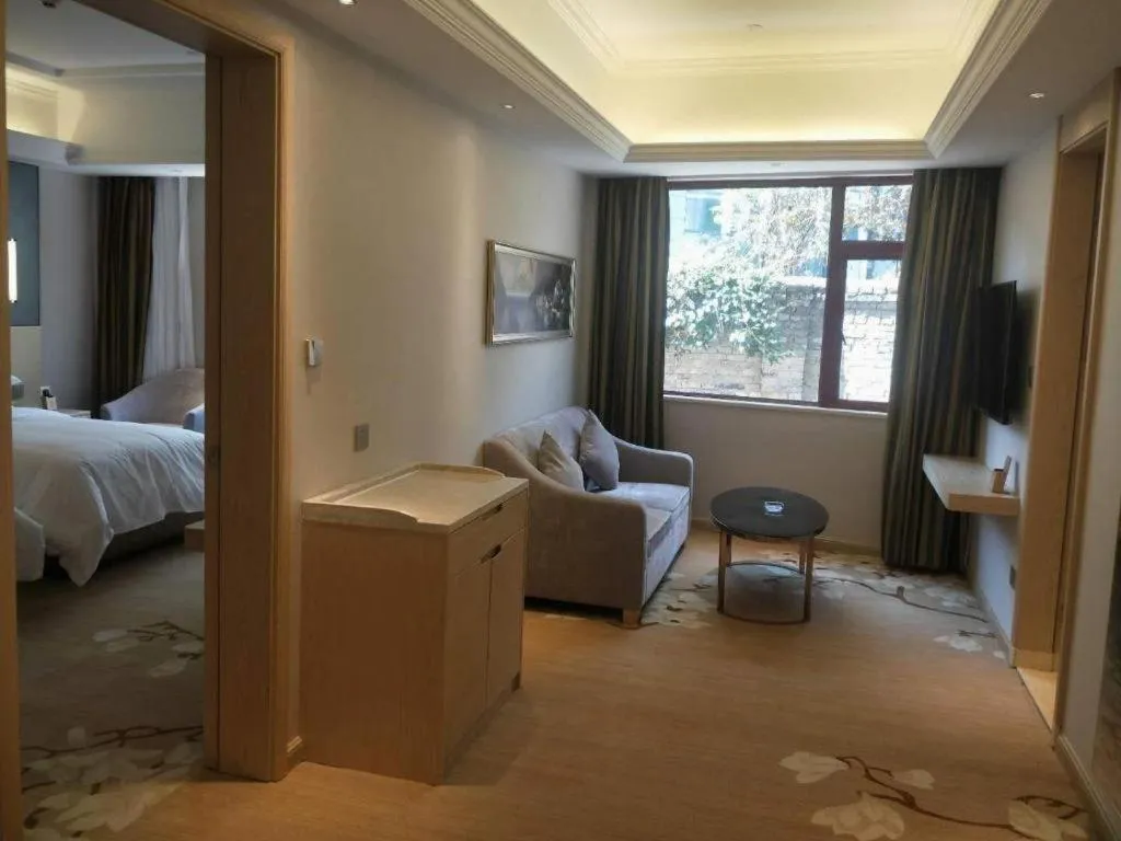 Bed in Vienna Hotel Yunnan Lijiang Ancient City