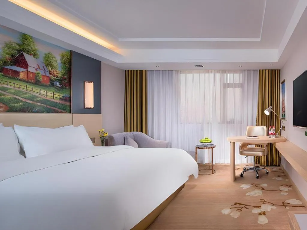 Bed in Vienna Hotel Yunnan Lijiang Ancient City