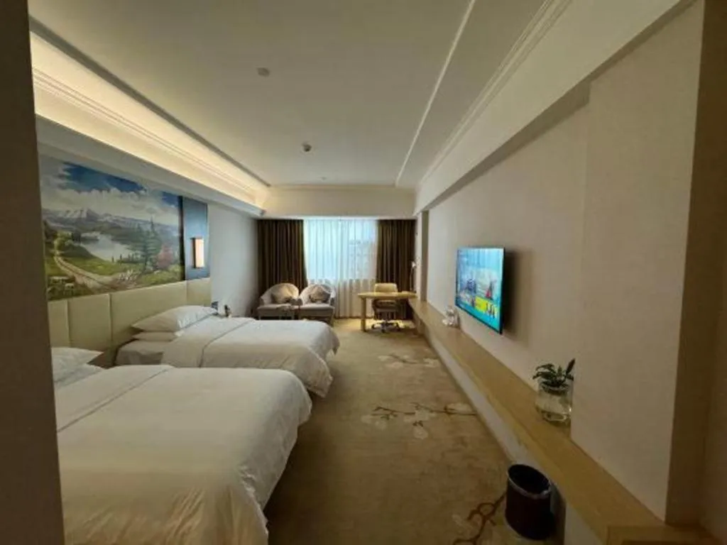 Bed in Vienna Hotel Yunnan Lijiang Ancient City