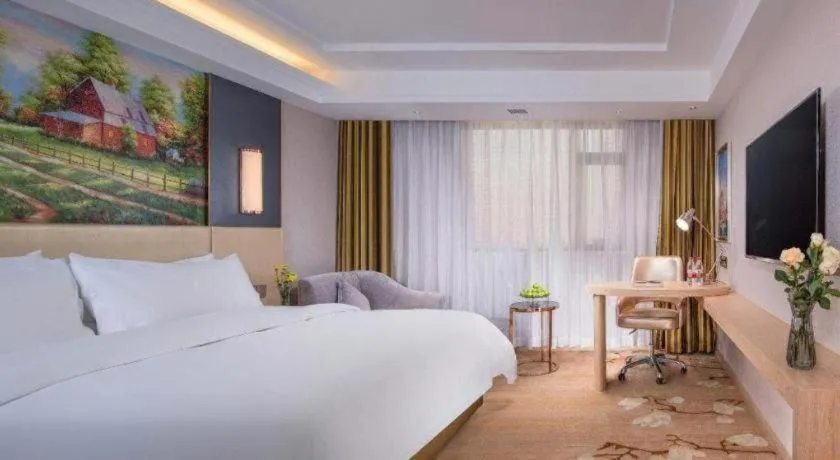 Bed in Vienna Hotel Yunnan Lijiang Ancient City