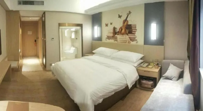 Bed in Vienna Hotel Yunnan Lijiang Ancient City