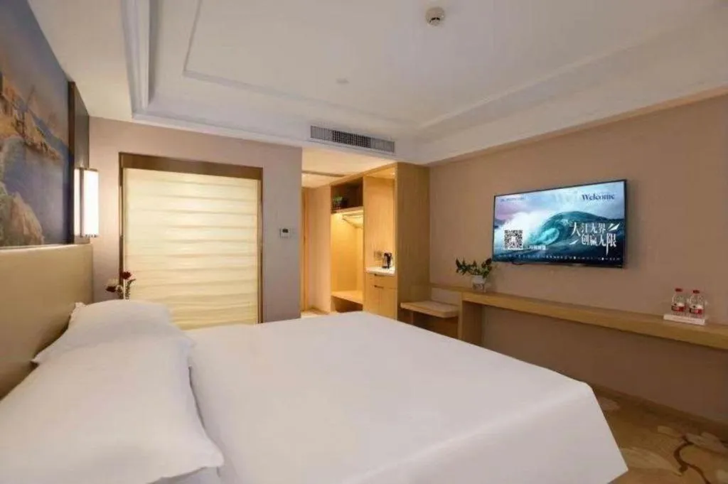 Bed in Vienna Hotel Yunnan Lijiang Ancient City