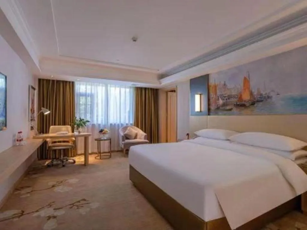 Bed in Vienna Hotel Yunnan Lijiang Ancient City