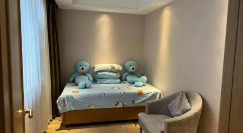 Bed in Vienna Hotel Yunnan Lijiang Ancient City Bed in Vienna Hotel Yunnan Lijiang Ancient City