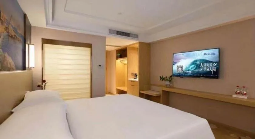 Bed in Vienna Hotel Yunnan Lijiang Ancient City