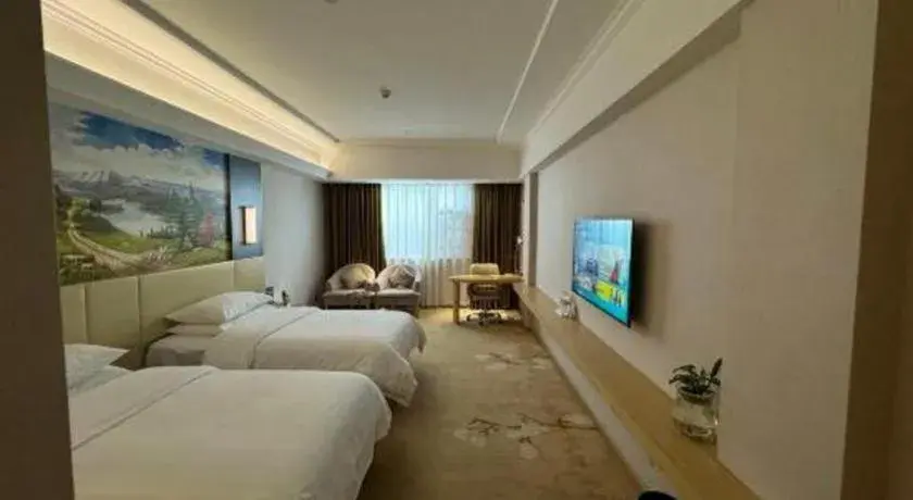 Bed in Vienna Hotel Yunnan Lijiang Ancient City Bed in Vienna Hotel Yunnan Lijiang Ancient City