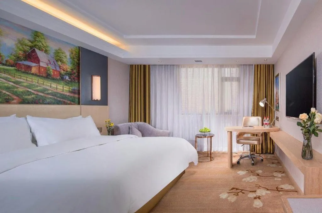 Bed in Vienna Hotel Yunnan Lijiang Ancient City