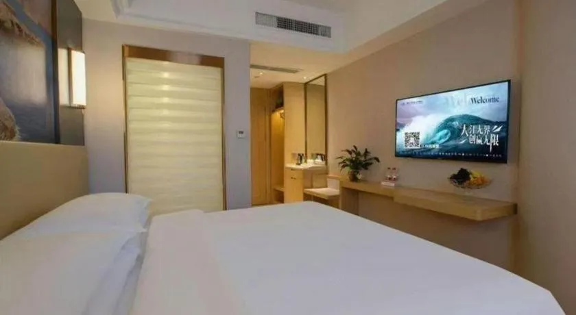 Bed in Vienna Hotel Yunnan Lijiang Ancient City