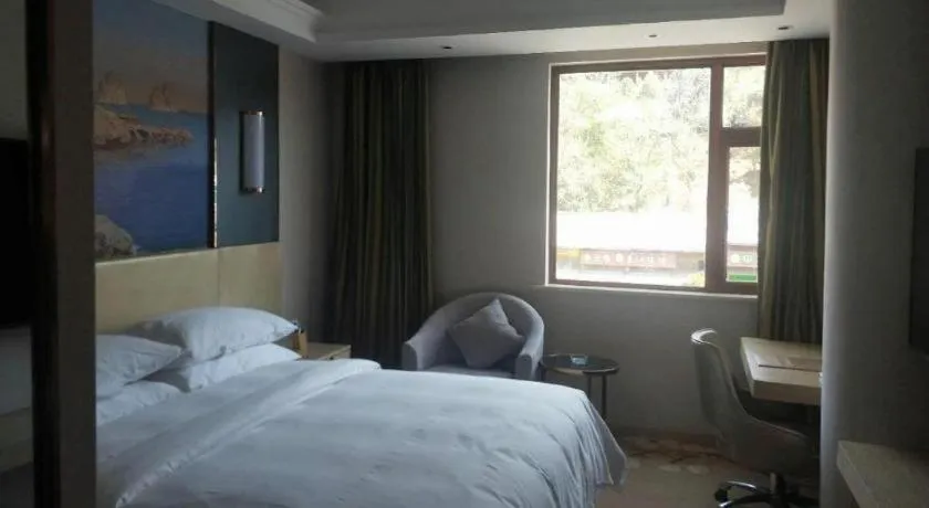 Bed in Vienna Hotel Yunnan Lijiang Ancient City