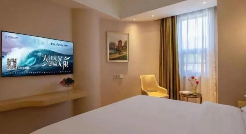 Bed in Vienna Hotel Yunnan Lijiang Ancient City