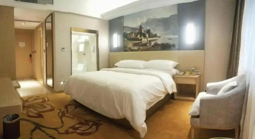 Bed in Vienna Hotel Yunnan Lijiang Ancient City