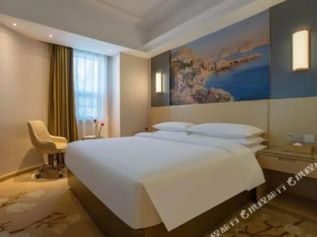 Bed in Vienna Hotel Yunnan Lijiang Ancient City