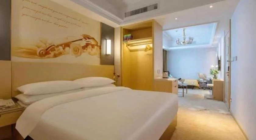 Bed in Vienna Hotel Yunnan Lijiang Ancient City