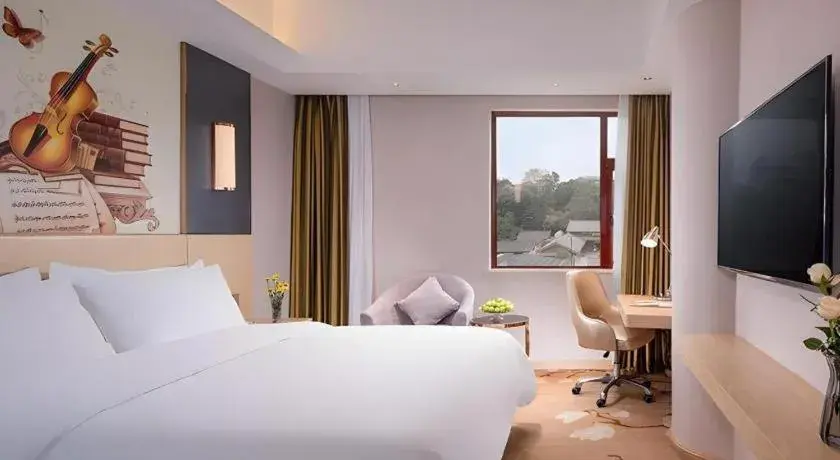 Bed in Vienna Hotel Yunnan Lijiang Ancient City Bed in Vienna Hotel Yunnan Lijiang Ancient City