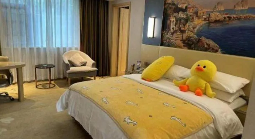 Bed in Vienna Hotel Yunnan Lijiang Ancient City