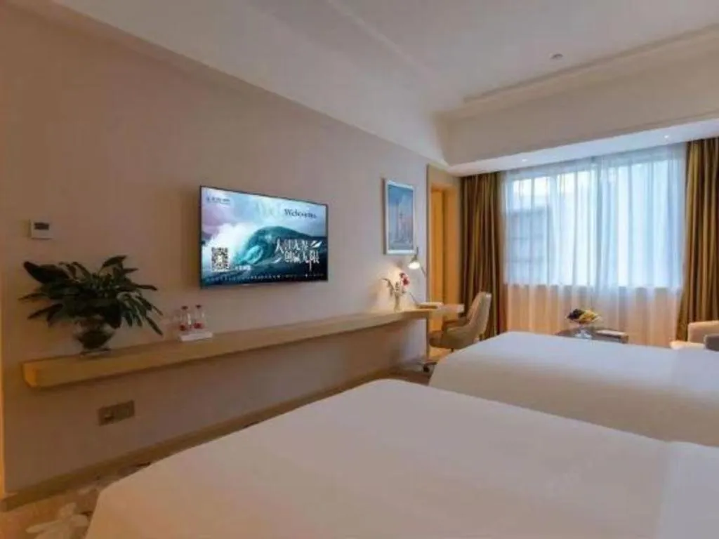 Bed in Vienna Hotel Yunnan Lijiang Ancient City