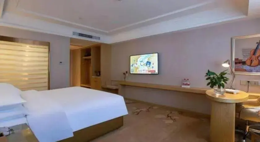 Bed in Vienna Hotel Yunnan Lijiang Ancient City Bed in Vienna Hotel Yunnan Lijiang Ancient City