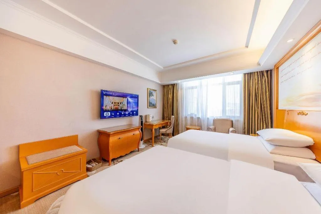 Bed in Vienna Hotel Qinghai Dachaidan