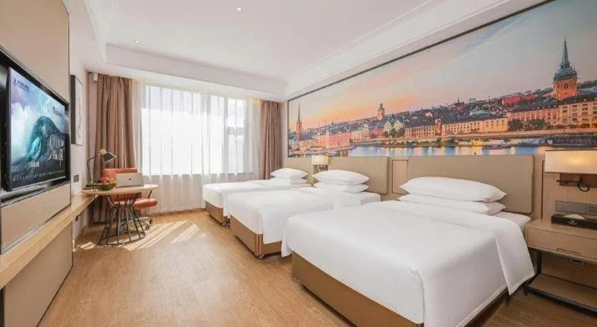 Bed in Vienna Hotel Qinghai Dachaidan