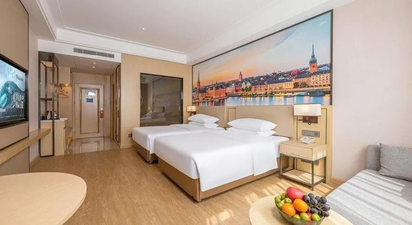 Bed in Vienna Hotel Qinghai Dachaidan