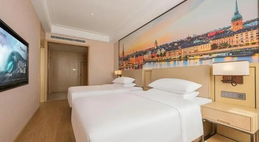 Bed in Vienna Hotel Qinghai Dachaidan