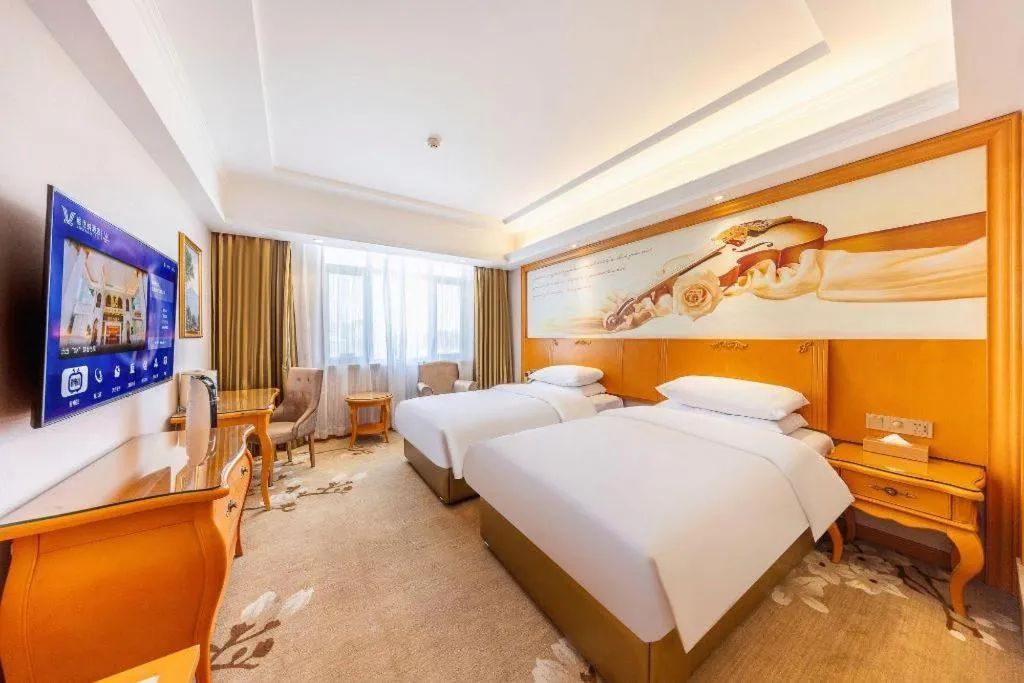 Bed in Vienna Hotel Qinghai Dachaidan